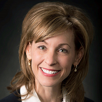 Headshot of Leanne Caret