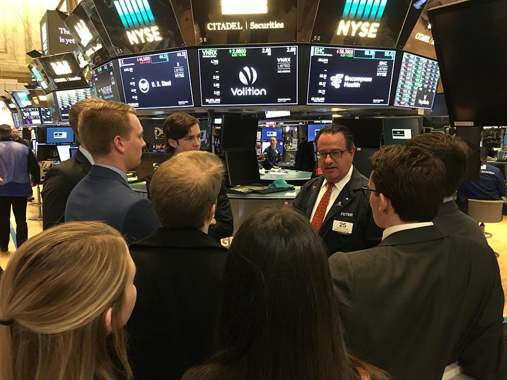 students viewing a stock exchange
