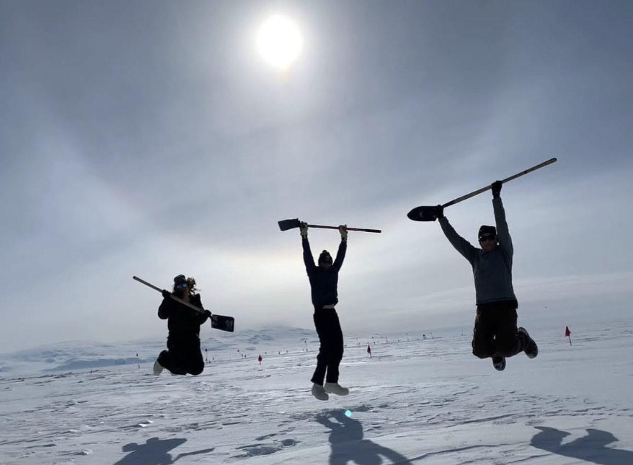 shoveling and jumping in the air