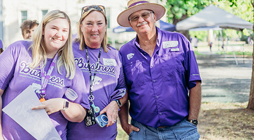 a family enjoying the tailgate