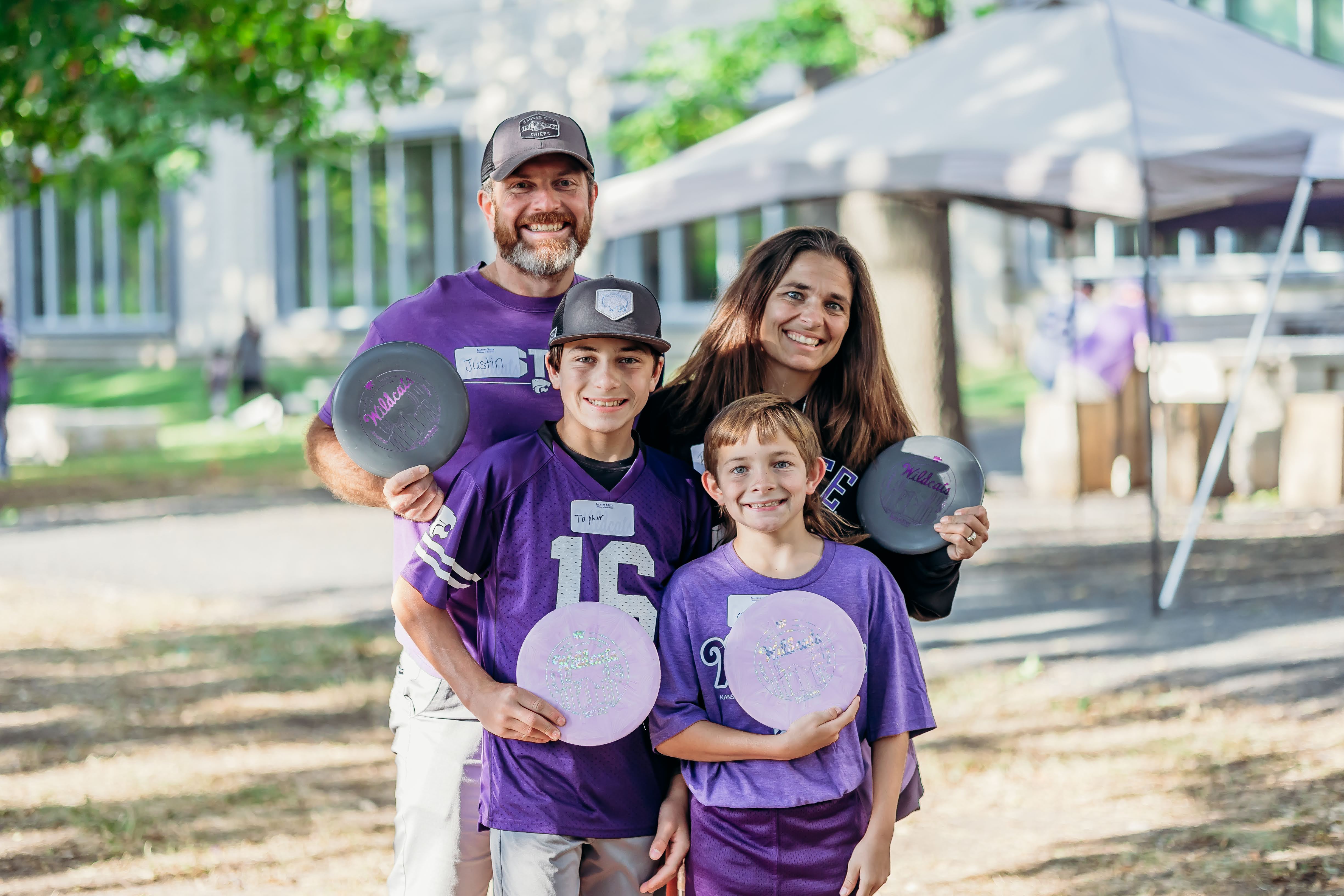 a family at the tailgate